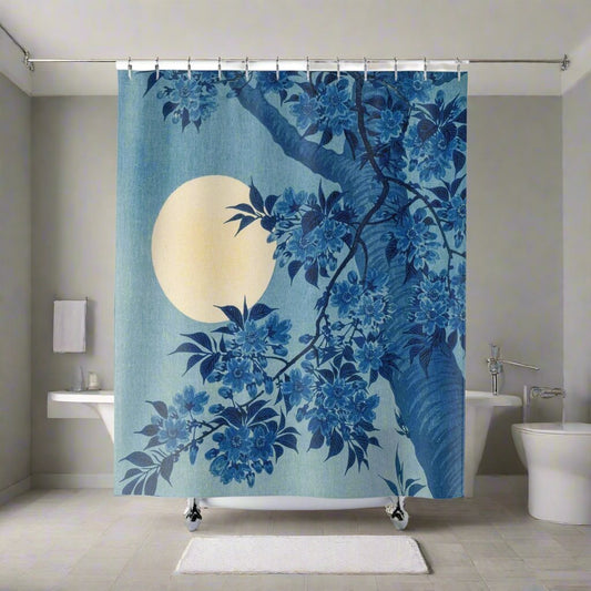Japanese-inspired cherry blossom and full moon shower curtain in a serene bathroom.
