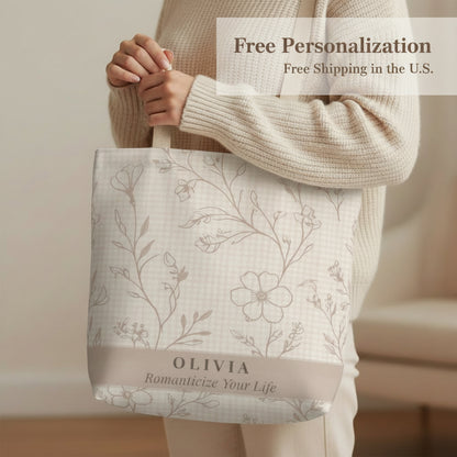 Tote bag with floral pattern and 'Olivia' branding on a white background