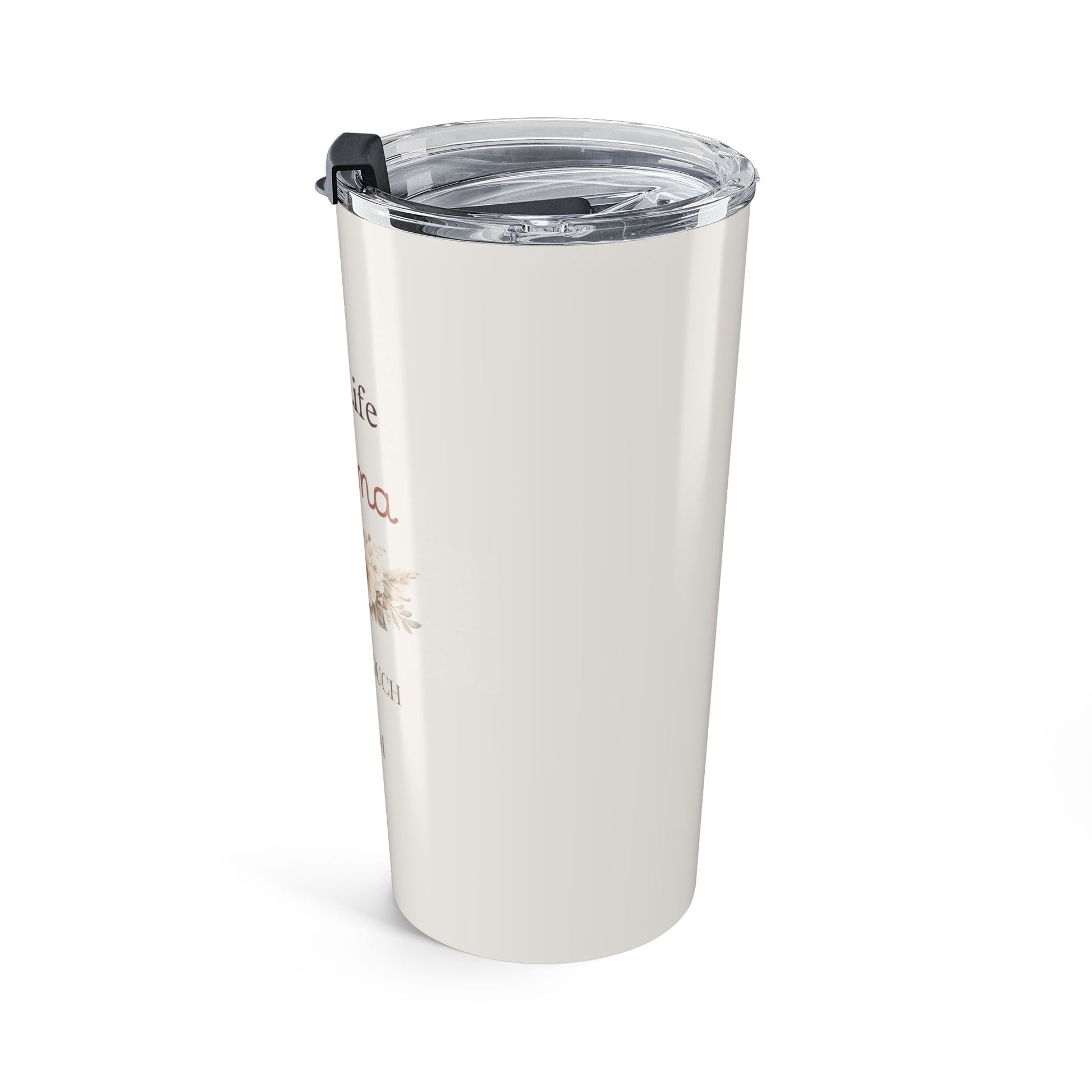 Angled view of white tumbler with text and a design on a white background