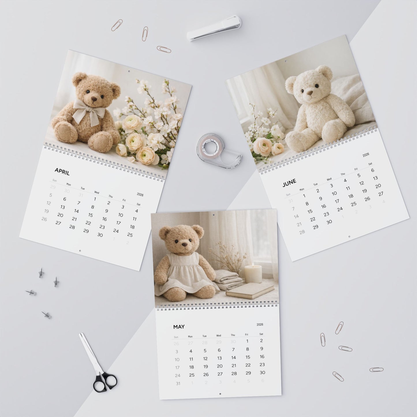 Calendar with teddy bear and floral design on a light gray background