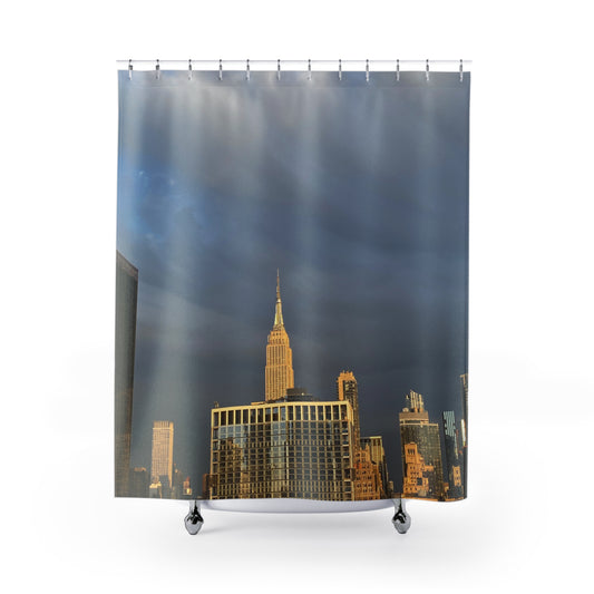 Full view of a shower curtain featuring the Empire State Building against a dramatic sky, ideal for NYC-inspired bathroom decor.
