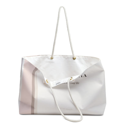 White tote bag with a visible brand logo on a white background