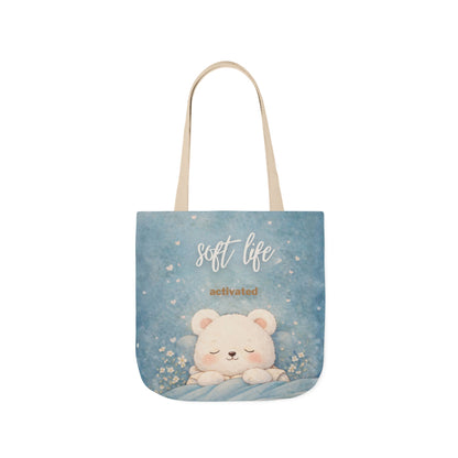 Tote bag with a bear illustration and text on a blue background