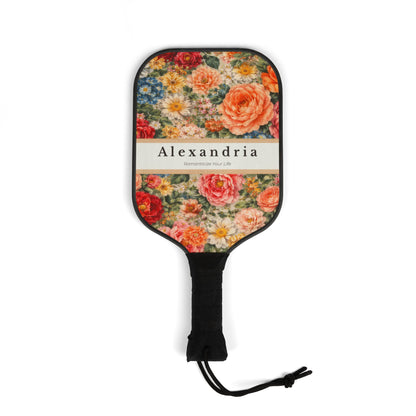 Floral-patterned paddle with 'Alexandria' branding on a white background