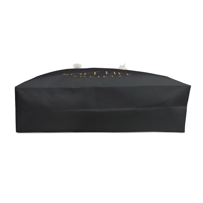Underside view of black weekender tote bag.