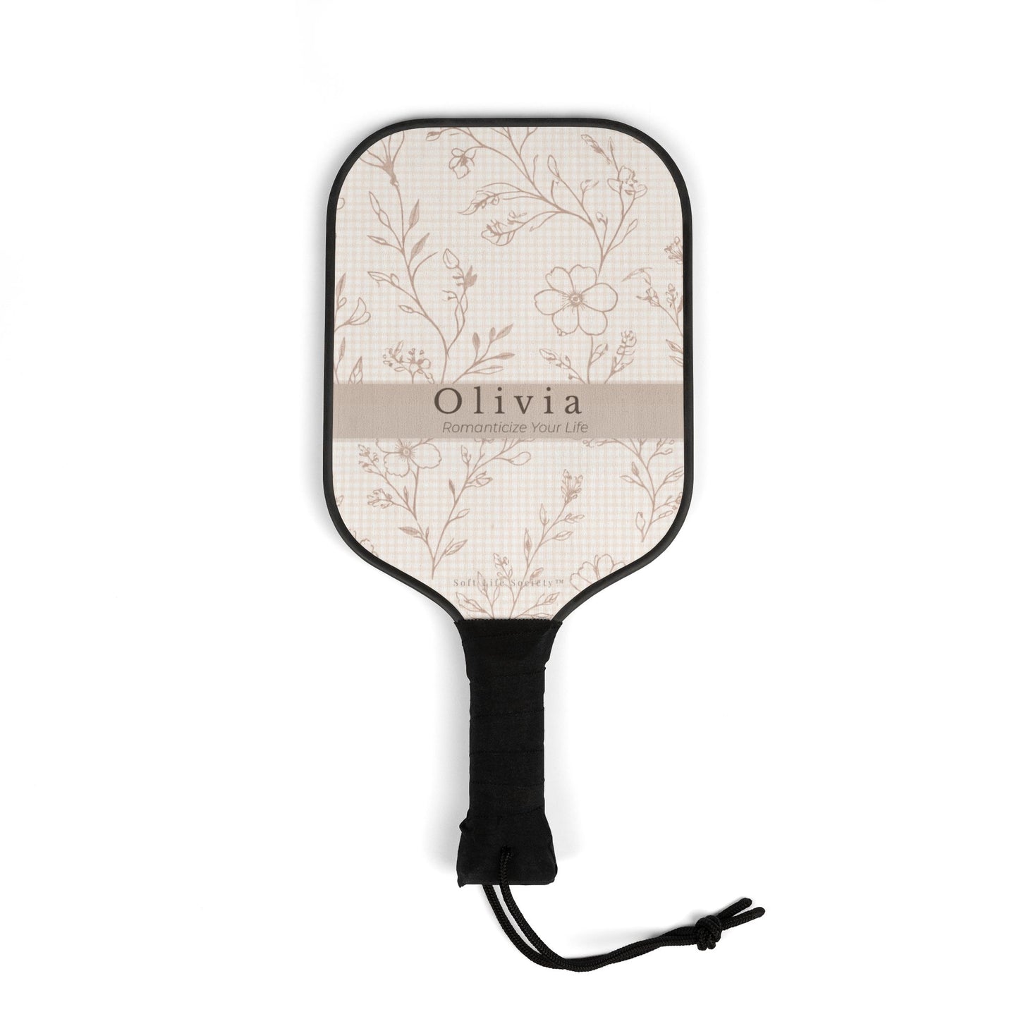 Floral-patterned paddle with 'Olivia' branding on a white background