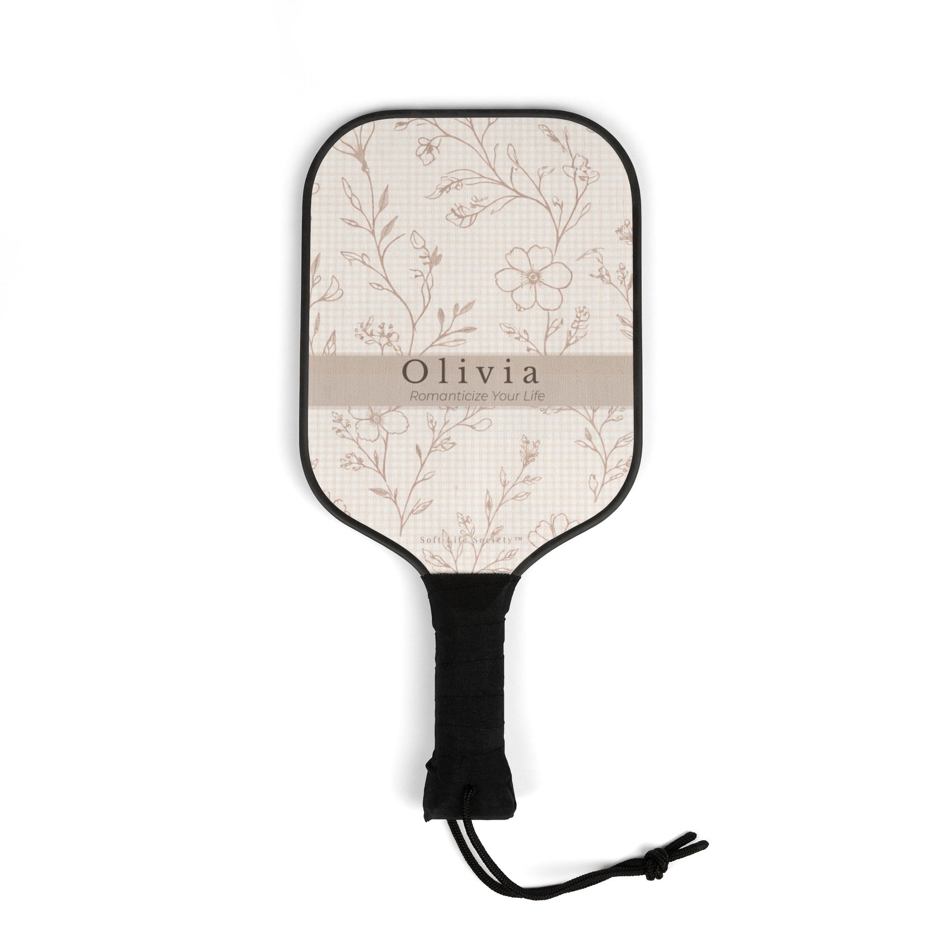 Floral-patterned paddle with 'Olivia' branding on a white background