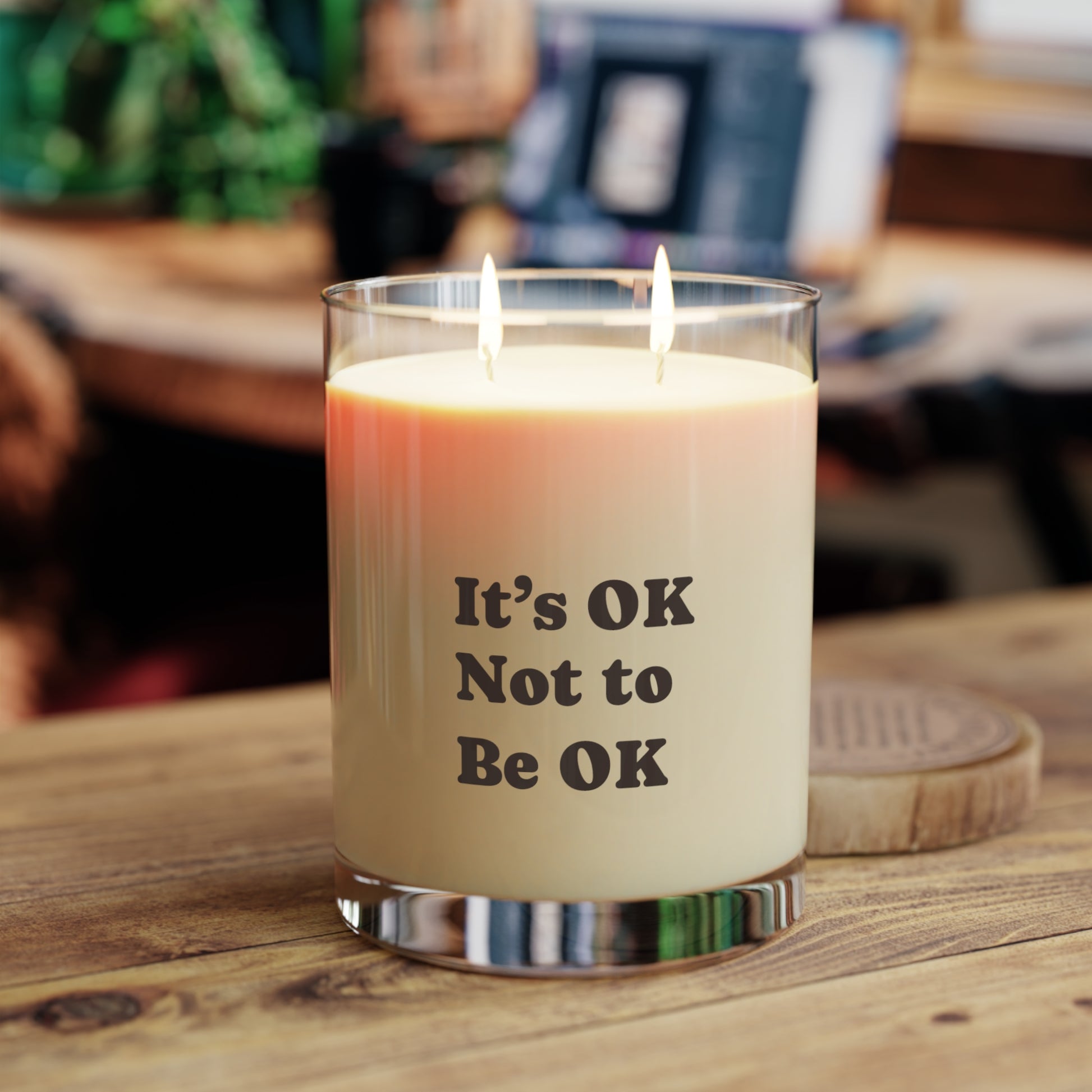 Soft Life Society Candle with 'It's OK Not to Be OK' text on a wooden surface