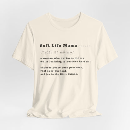 White t-shirt with 'Soft Life Mama' text on a light gray background