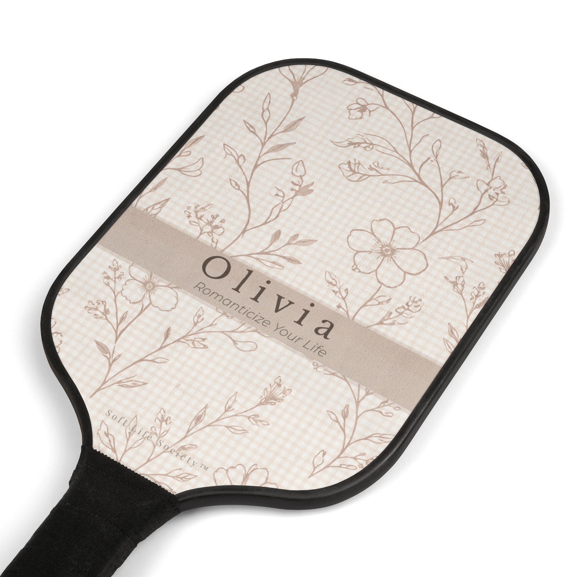 Paddle with floral pattern and 'Olivia' branding on a white background