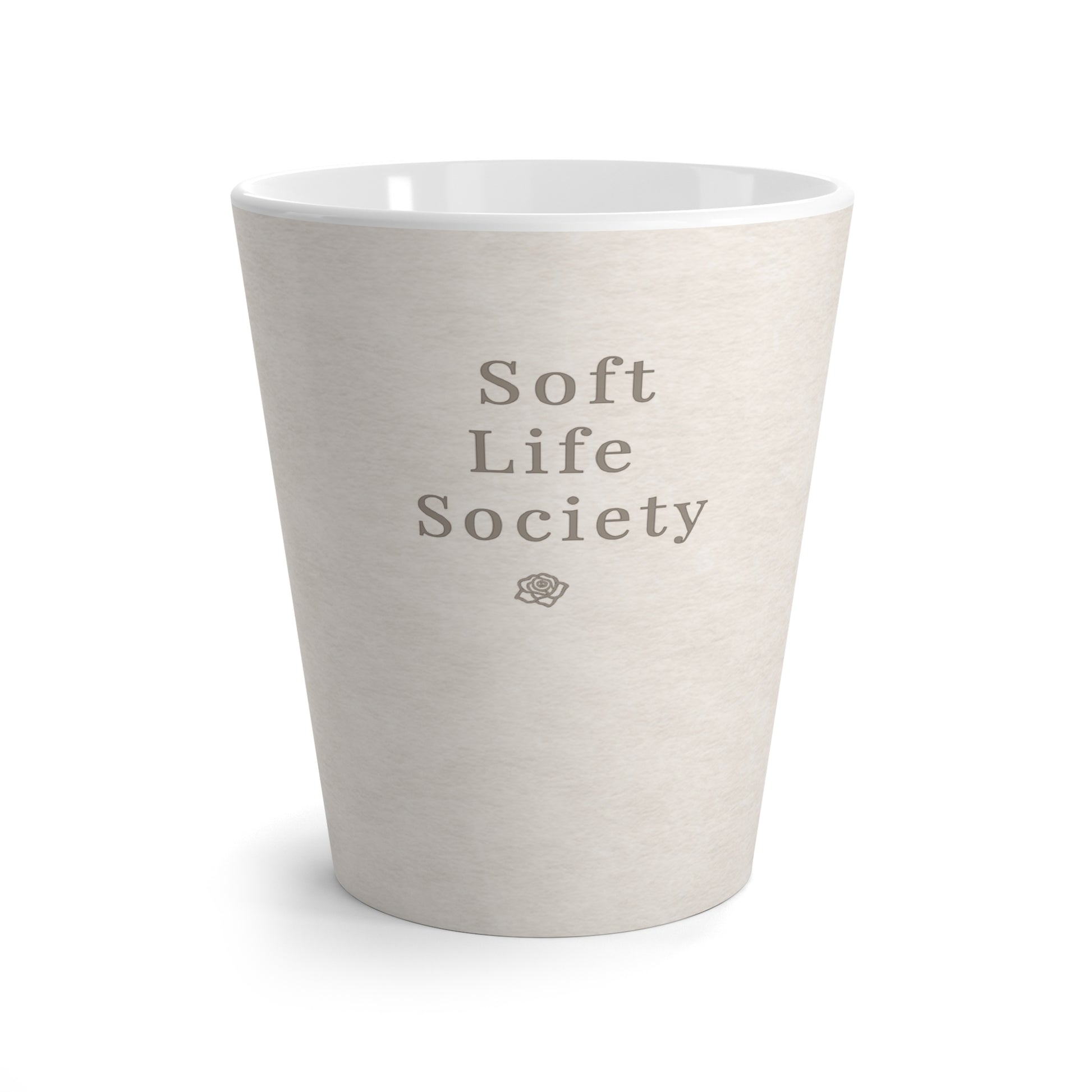 Cream ceramic cup with 'Soft Life Society' text on a white background