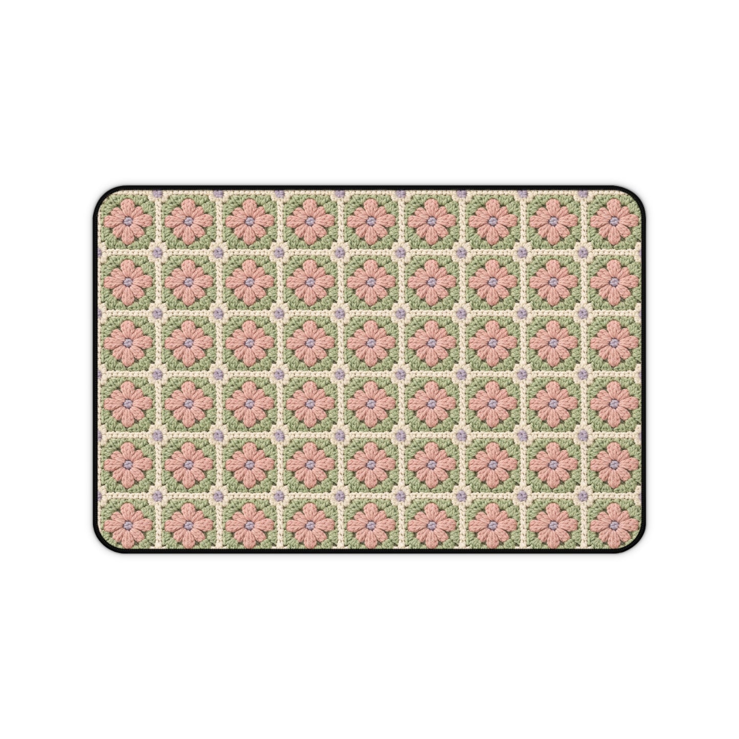 Patterned doormat with pink flowers on a white background