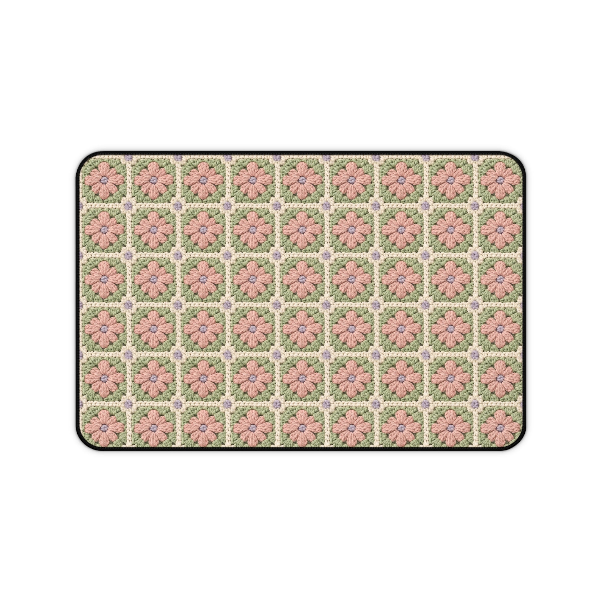 Patterned doormat with pink flowers on a white background