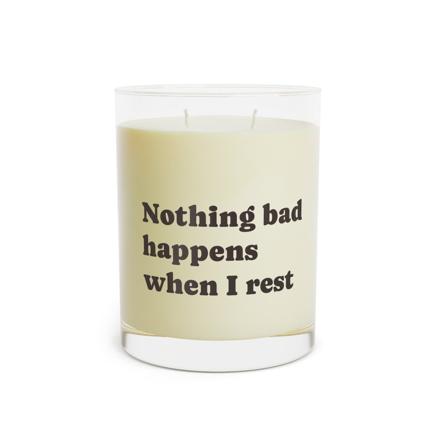 Soft Life Society Affirmation Candle with a label reading 'Nothing bad happens when I rest' on a white background