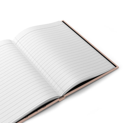 Open journal notebook with lined pages on a white background