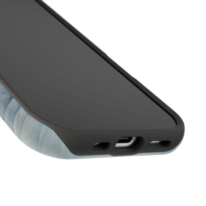 Close-up of phone case bottom showing charging port openings and slim protective edge