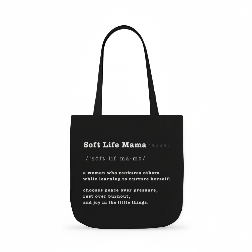 Black tote bag with 'Soft Life Mama' text on a white background