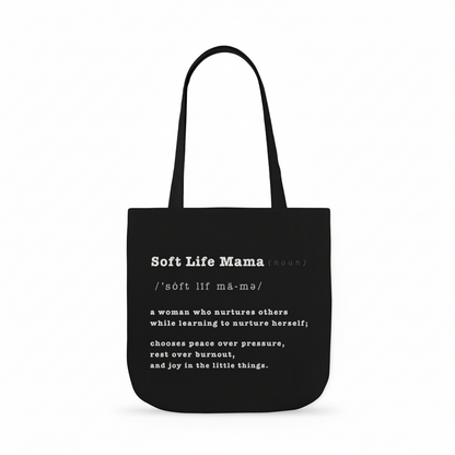 Black tote bag with 'Soft Life Mama' text on a white background