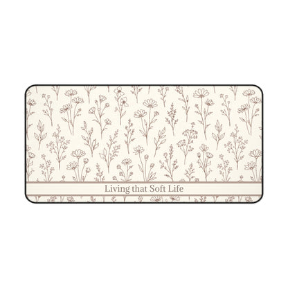 Rectangular desk mat with floral pattern and 'Living that Soft Life' text on a white background