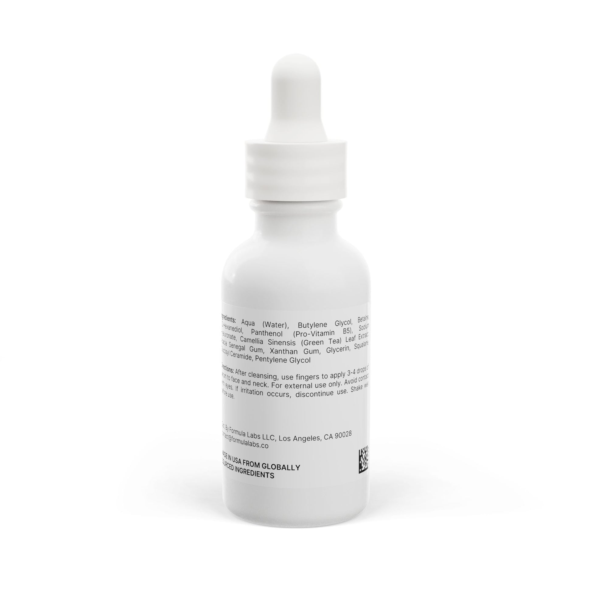 White dropper bottle with ingredient label on a white background