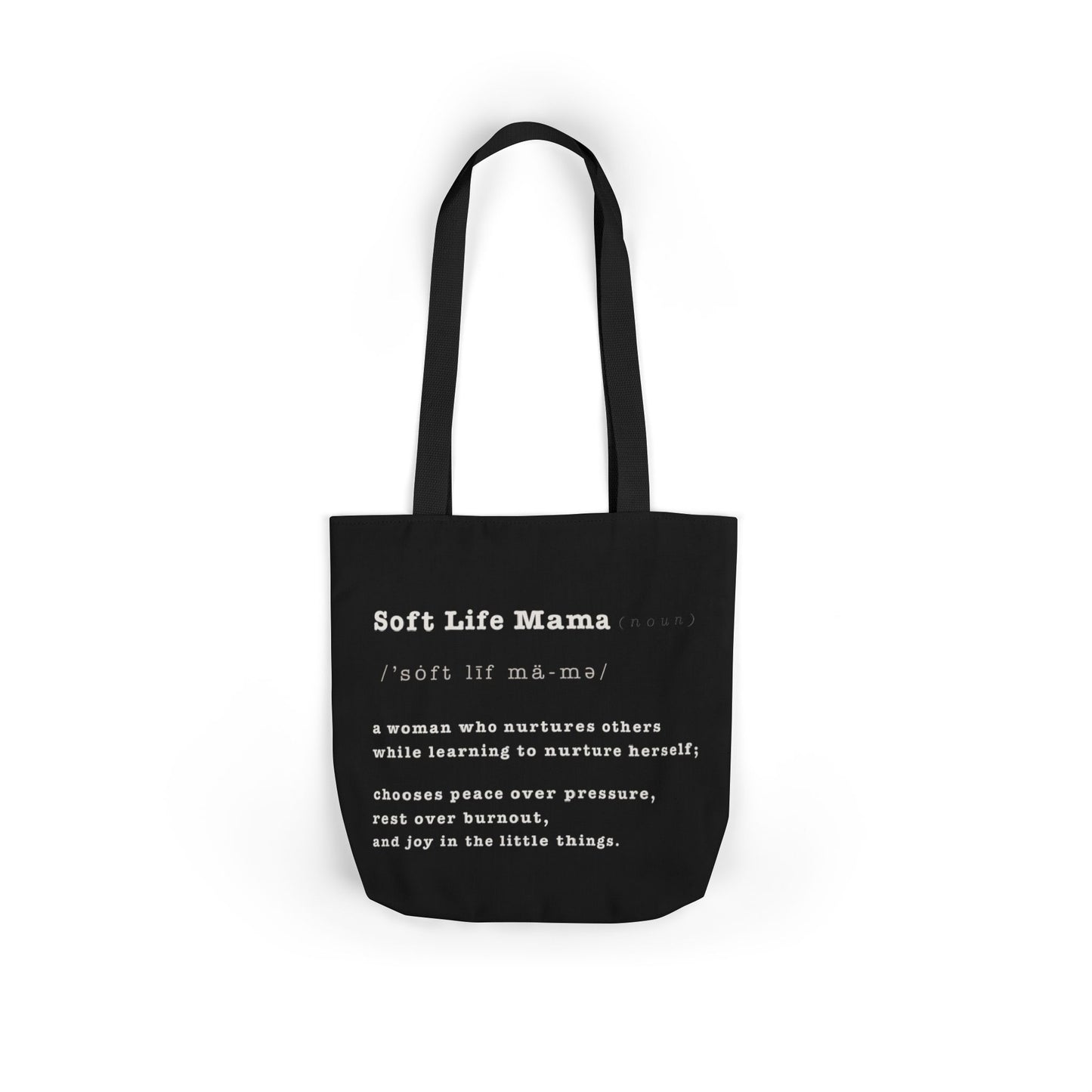 Black tote bag with white text on a white background