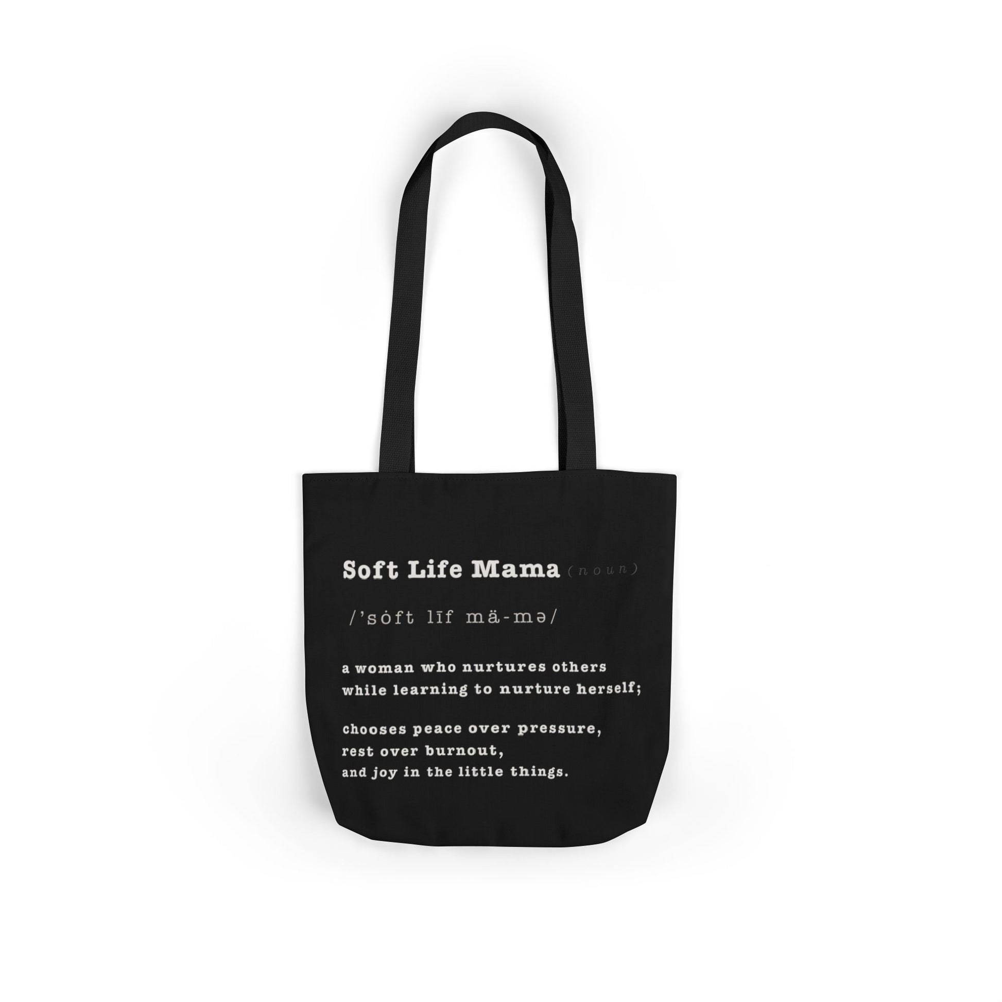 Black tote bag with white text on a white background