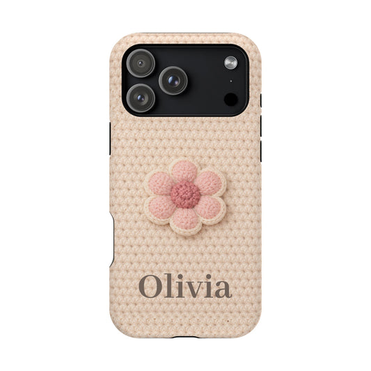 Phone case with a pink flower and 'Olivia' text on a textured beige background