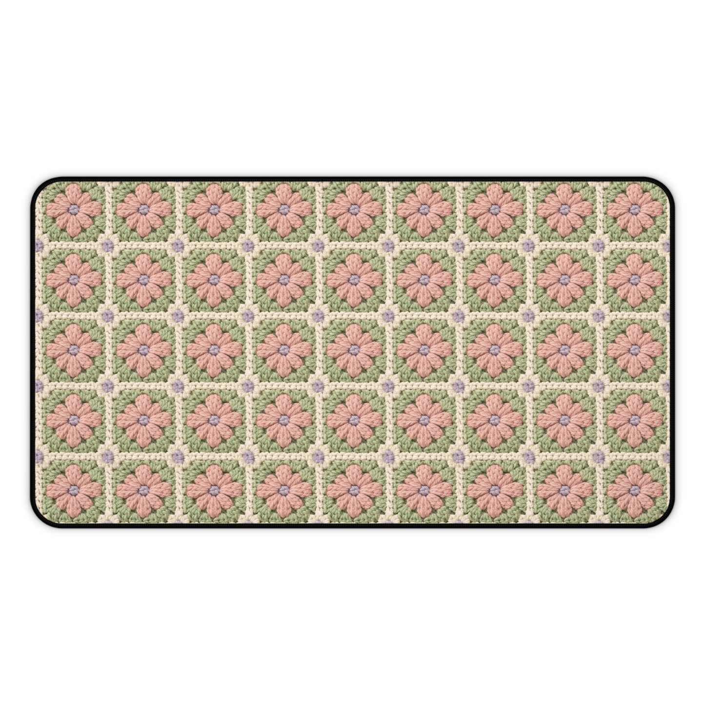 Floral patterned doormat with pink flowers on a green background