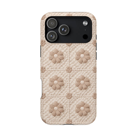 Neutral crochet iPhone case with floral pattern on a white background
