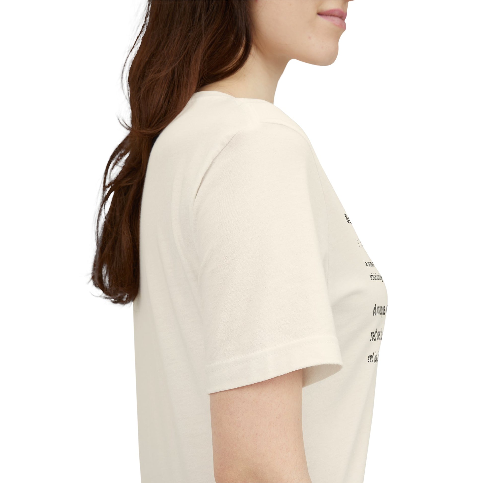 Beige t-shirt with 'New York Fashion Week' text worn by a person on a white background