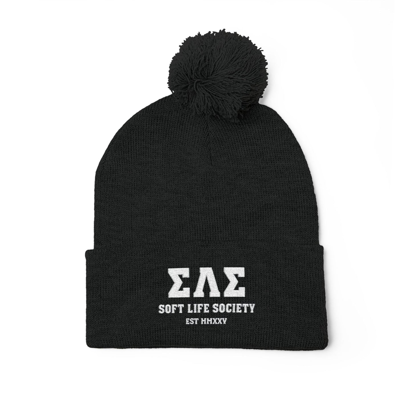 Black beanie with pom-pom and 'Soft Life Society' text on a white background