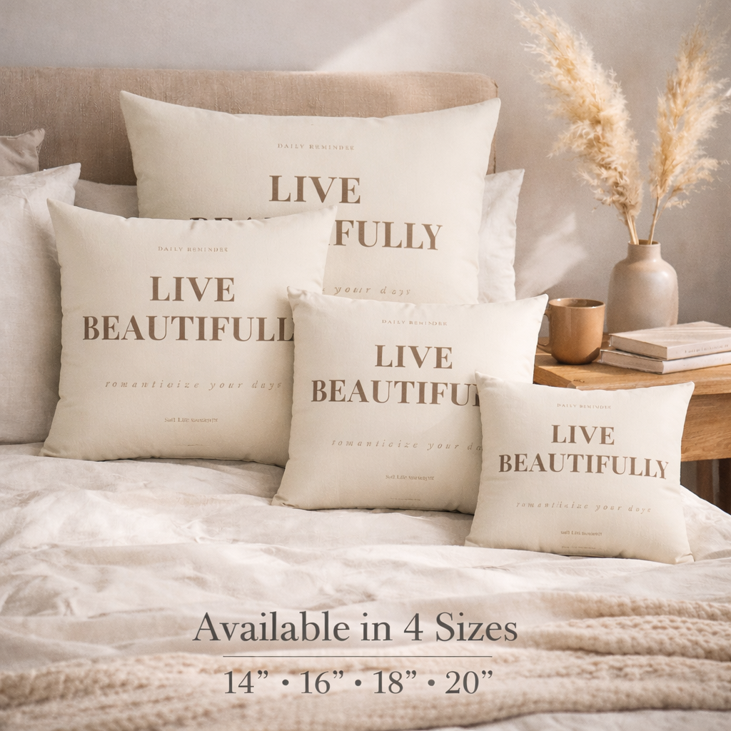 Size guide with decorative pillows with motivational phrases on a bed in a cozy bedroom setting.