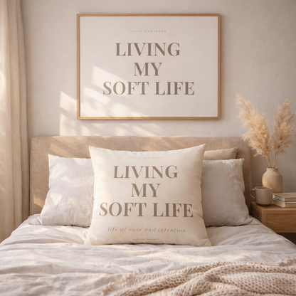 Bedroom with 'Living My Soft Life' pillows and decor