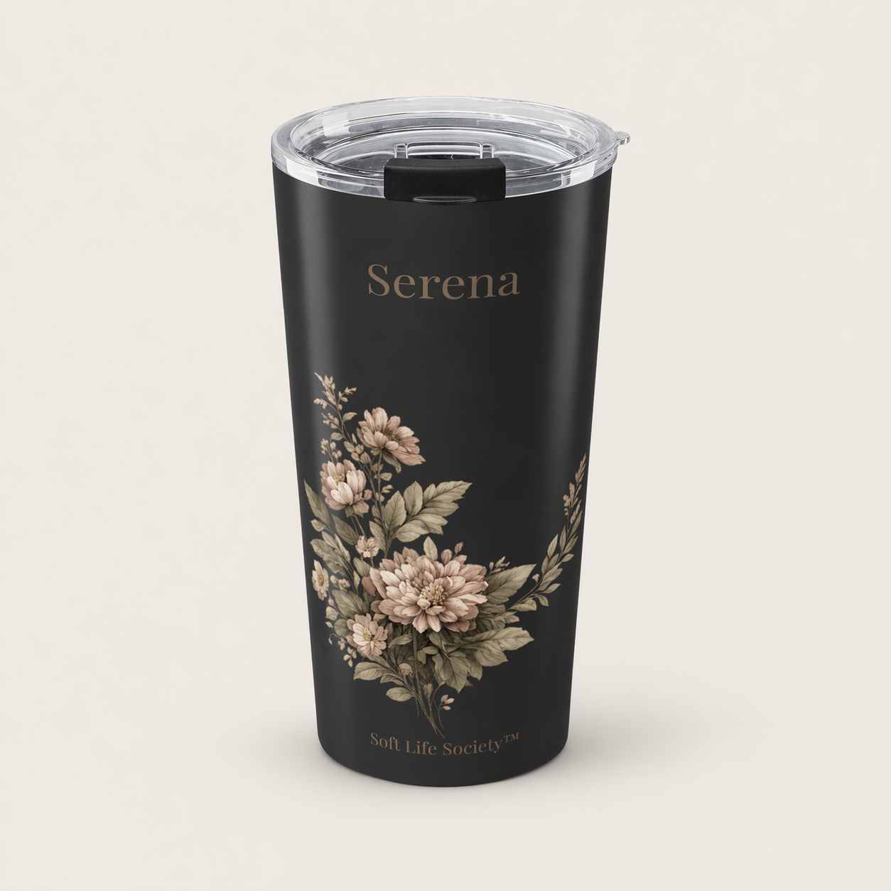Black tumbler with floral design and 'Serena' branding on a beige background
