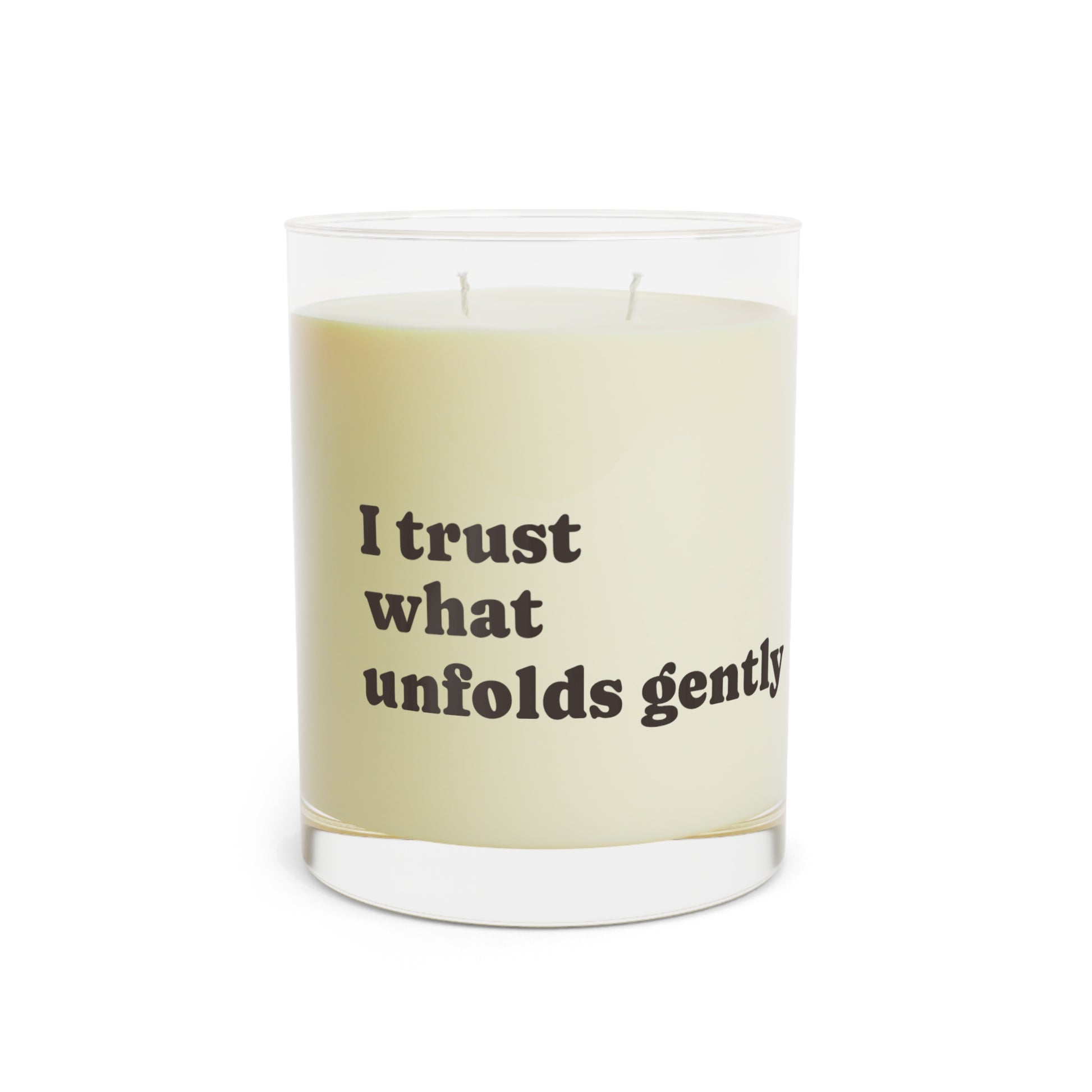 Soft Life Society Affirmation Candle with a message 'I trust what unfolds gently' on a white background