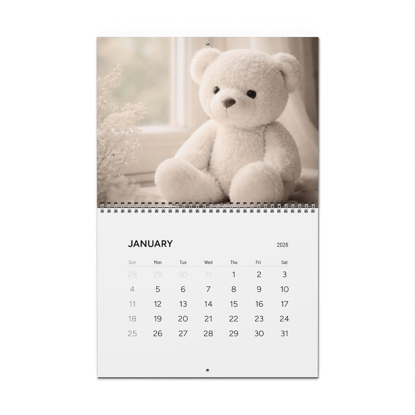 Calendar with a teddy bear on a white background