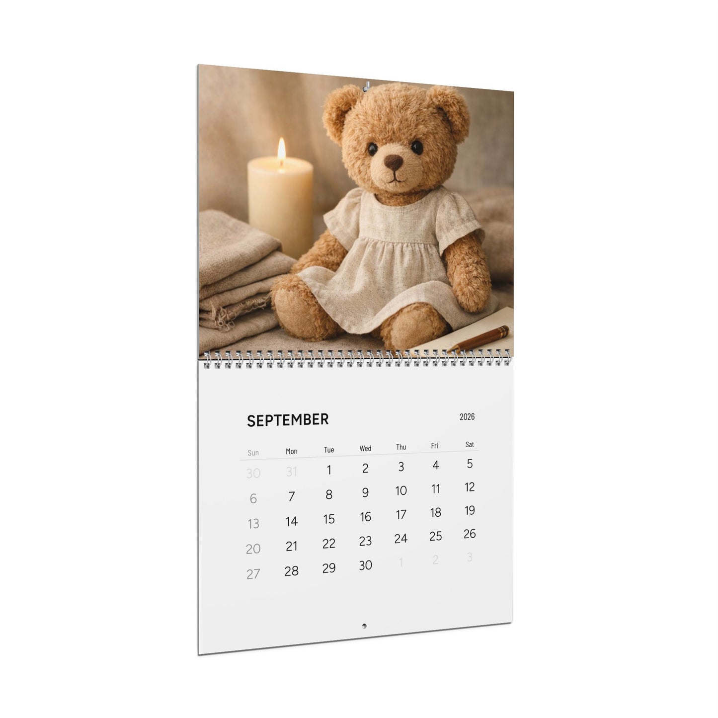 Calendar with a teddy bear in a dress on a white background
