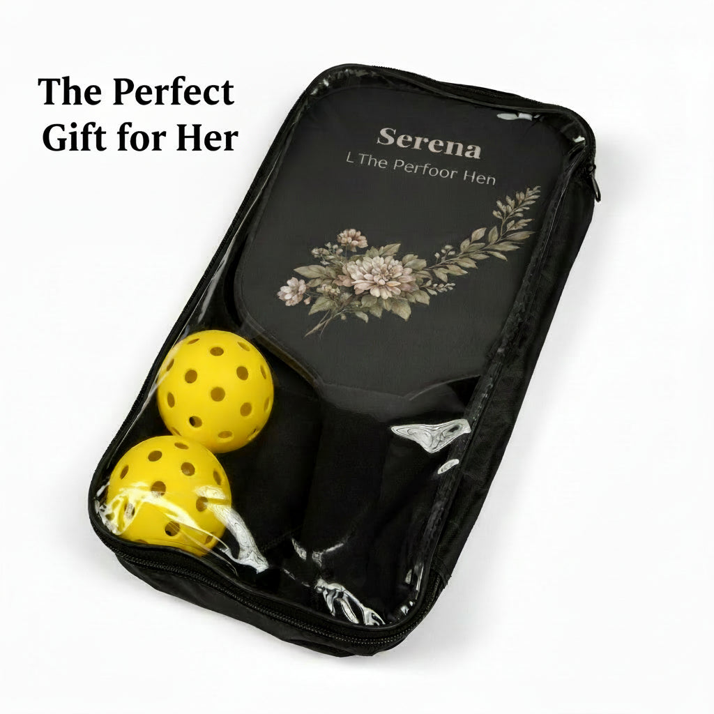 Black carrying case with yellow balls and floral design on a white background