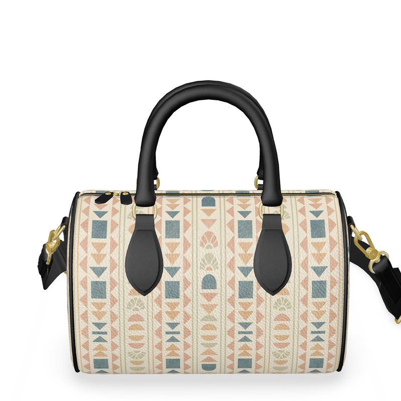 Patterned handbag with black handles and trim on a white background