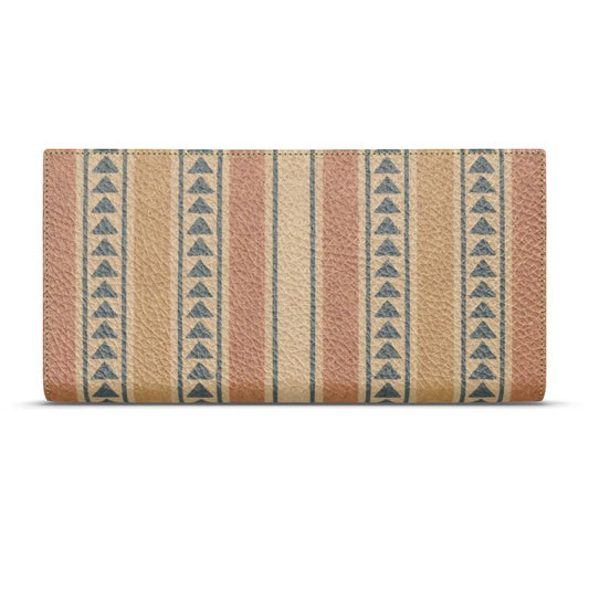Amara Heritage Microprint™ Travel Wallet shown closed, featuring warm geometric stripes printed on pebbled leather.
