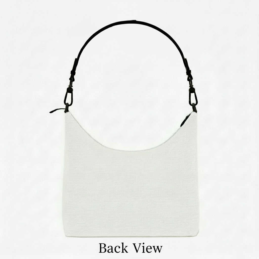 Back view of white tote bag with black strap on a white background