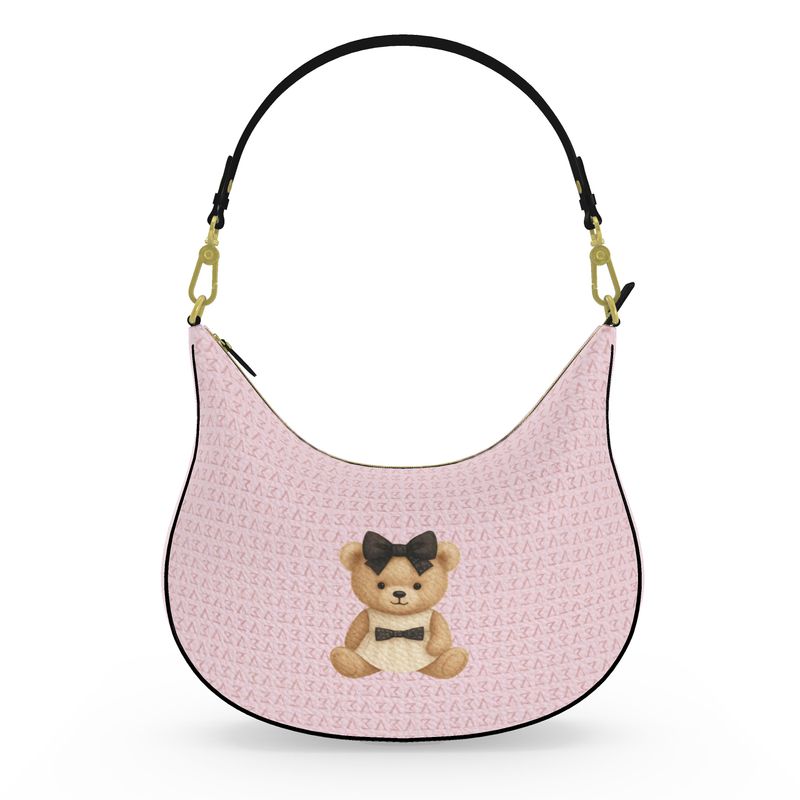 Front view of the Le Petit Teddy™ Curve Hobo in Blush Couture Monogram, full-grain Nappa leather with teddy emblem.