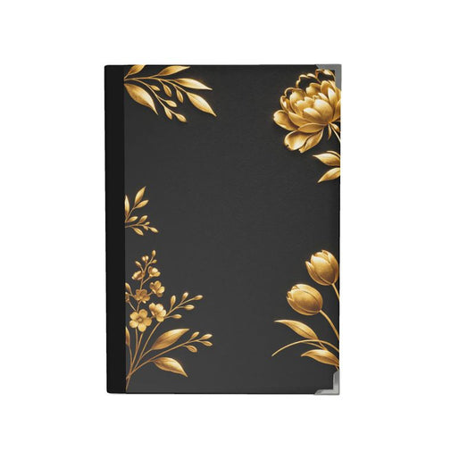 Black notebook with gold floral designs on a white background