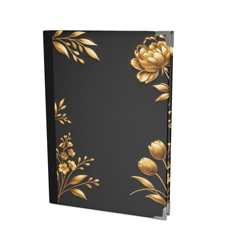 Black notebook with gold floral designs on a white background