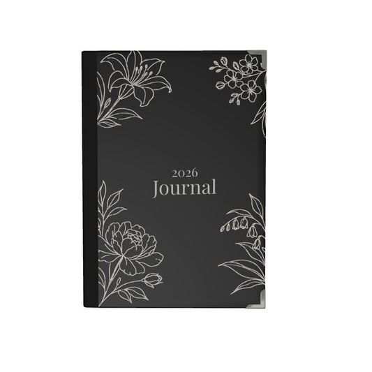 Black journal with floral designs and '2026 Journal' text on a white background