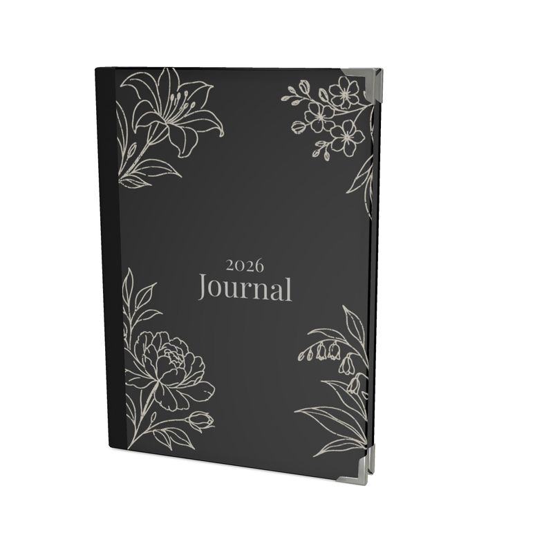 Black journal with floral designs and '2026 Journal' text on a white background