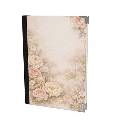 Notebook with floral and teddy bear design on a white background