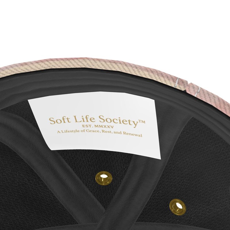 Close-up of a product with 'Soft Life Society' label on a white background