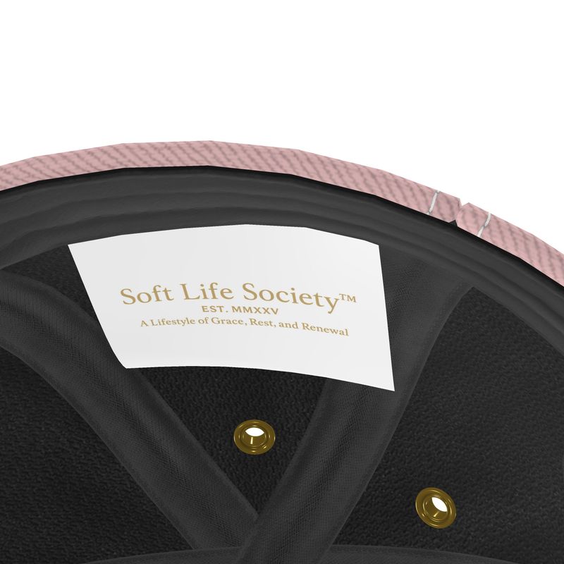 Interior label of blush pink baseball cap showing Soft Life Society branding