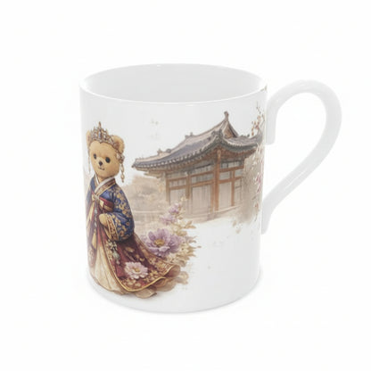 Mug with a design of a bear in traditional attire and a building in the background
